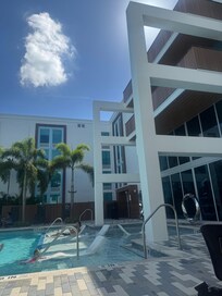 Poolside view of balcony rooms.