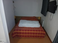 Chambre avec porte coulissante