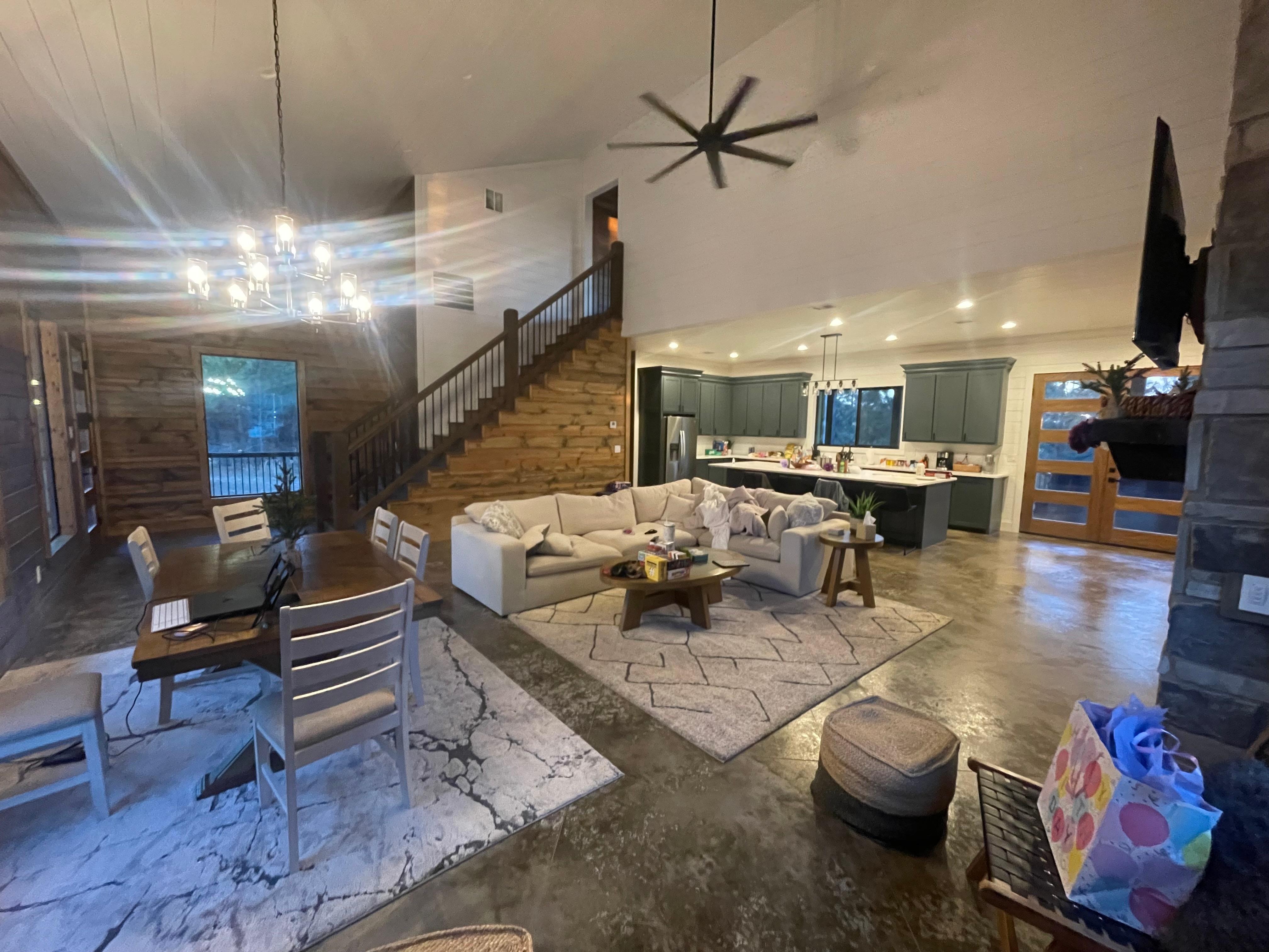 Living room is open and spacious with lots of seating. 