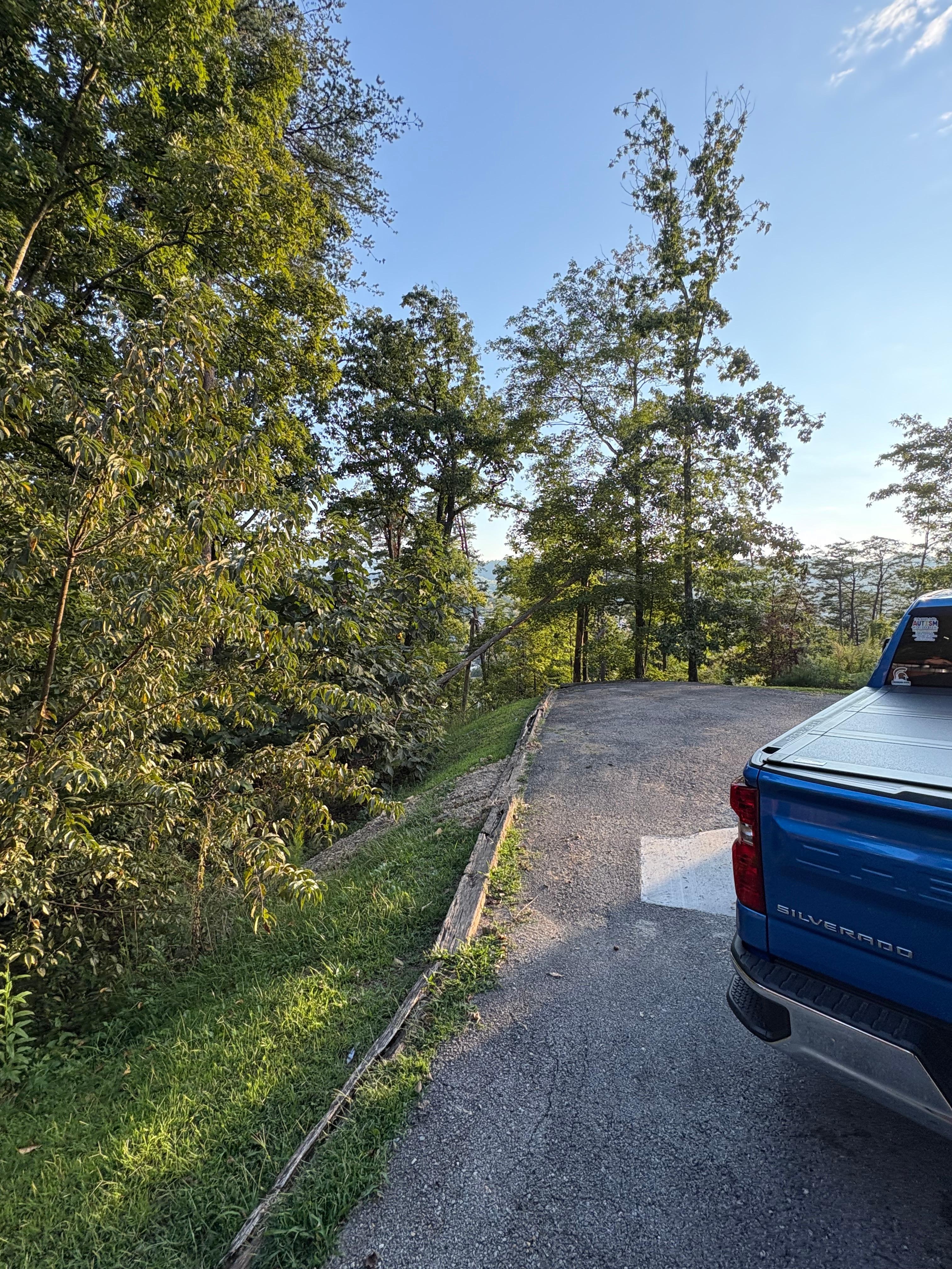 End of drive way by garage 