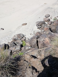 30 foot drop to the beach- if there's a better way down, directions would be great!