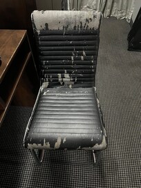 What kind of chair is this, picked up off the side of a road?