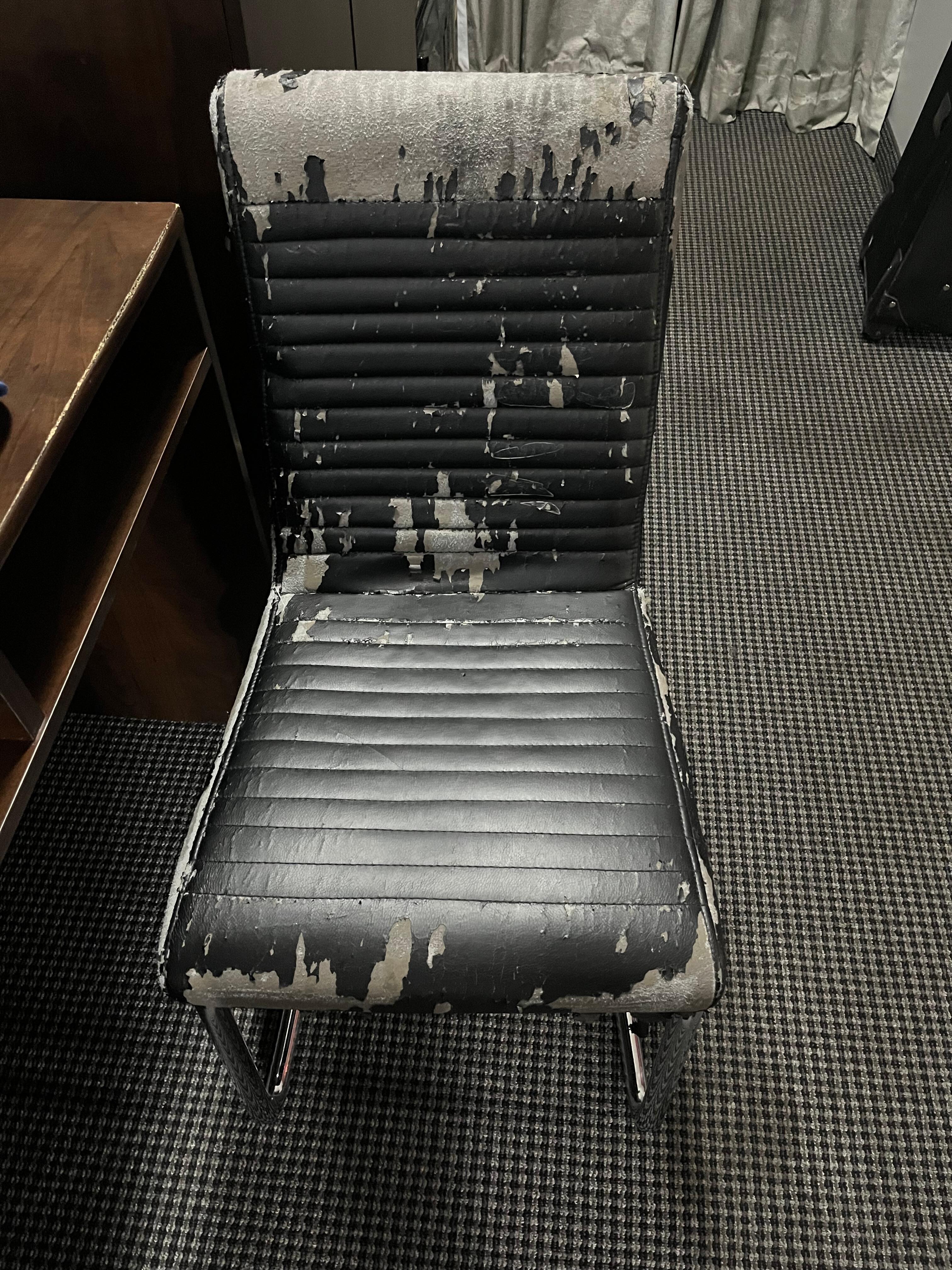 What kind of chair is this, picked up off the side of a road? 