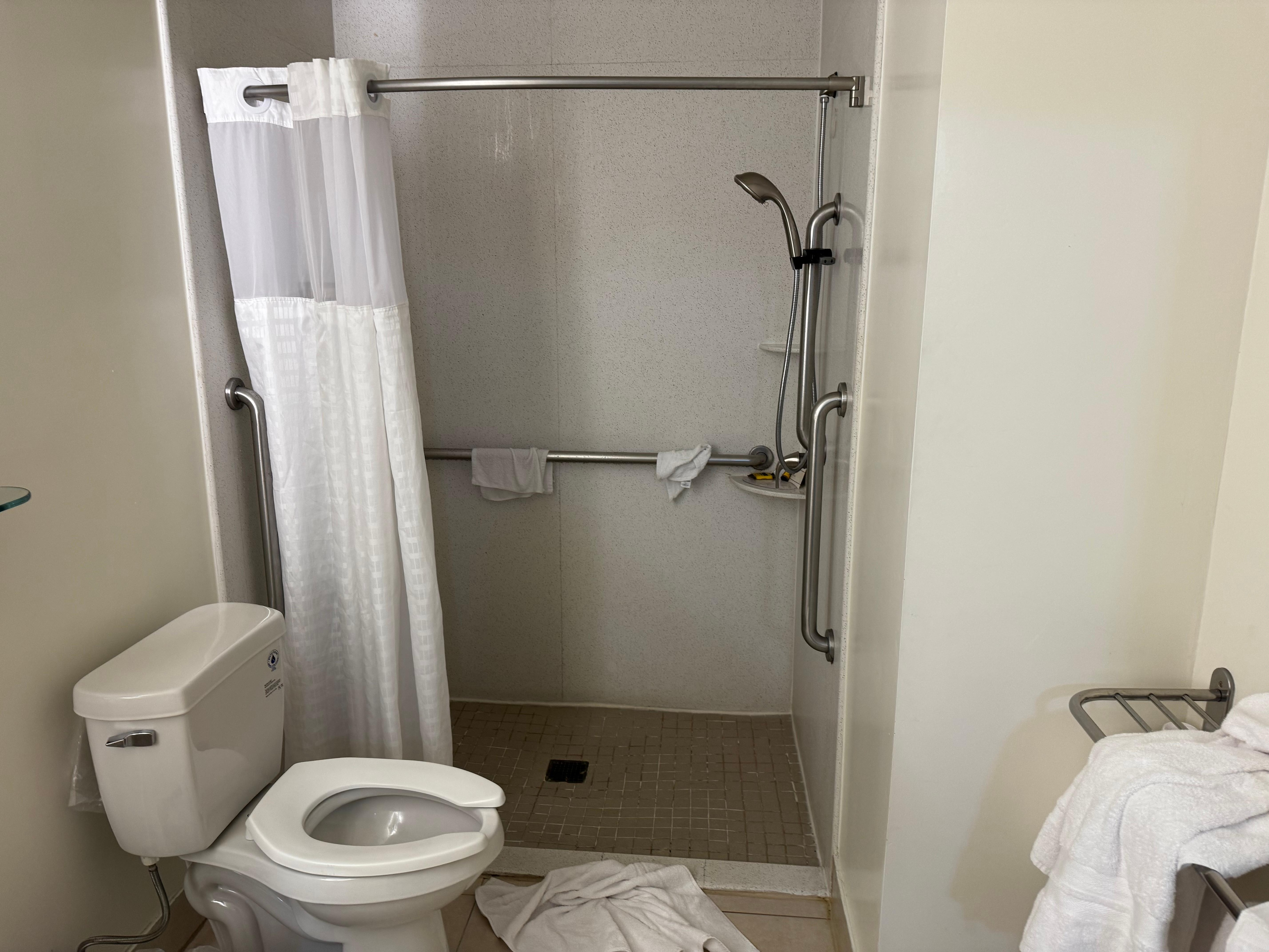 Recently refurbished but the waters leaks on the floor upon shower.Curtain too short to deflect water going to the floor.Need a higher barrier for water