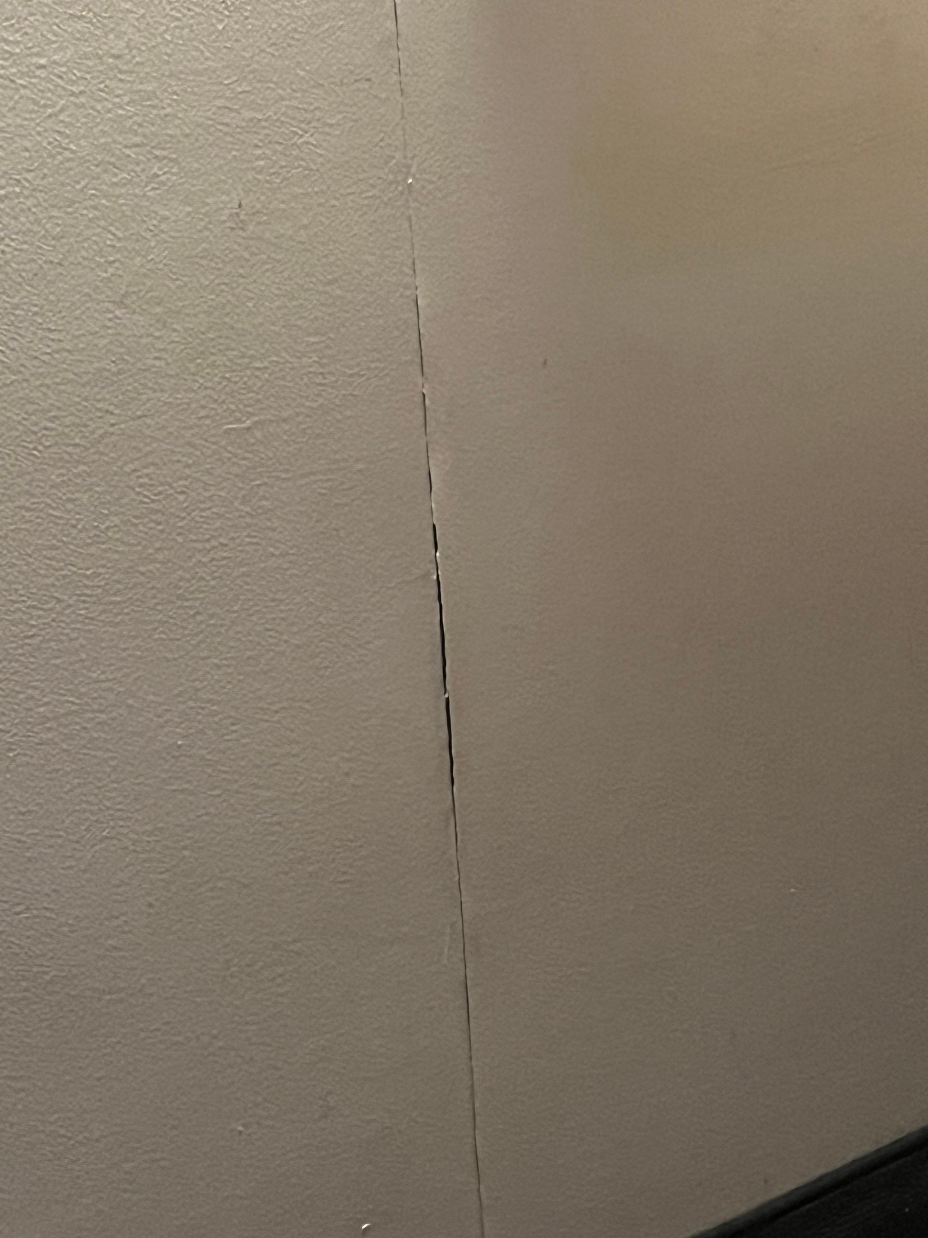 Ripped up walls with some holes.