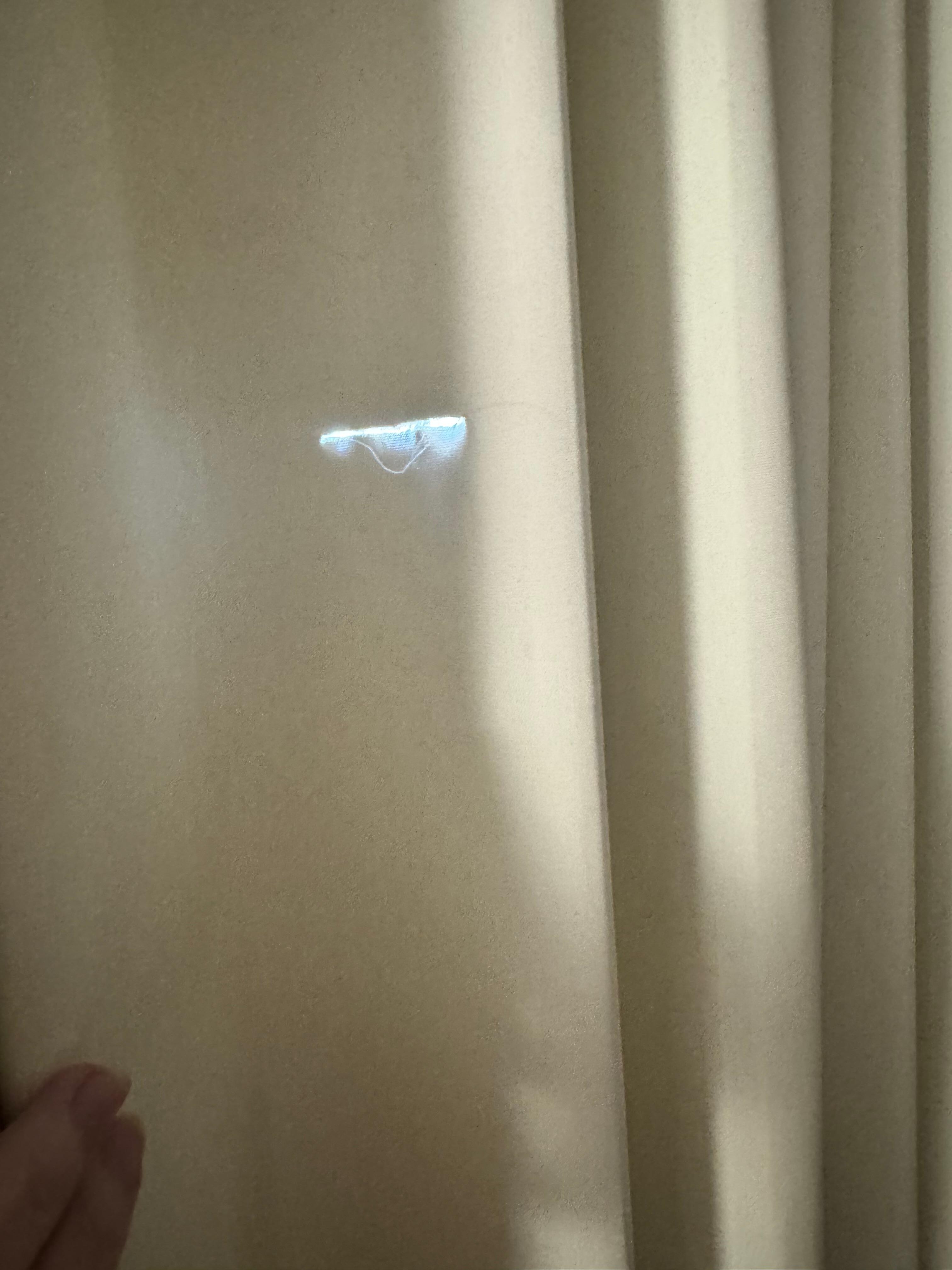 Ripped curtain