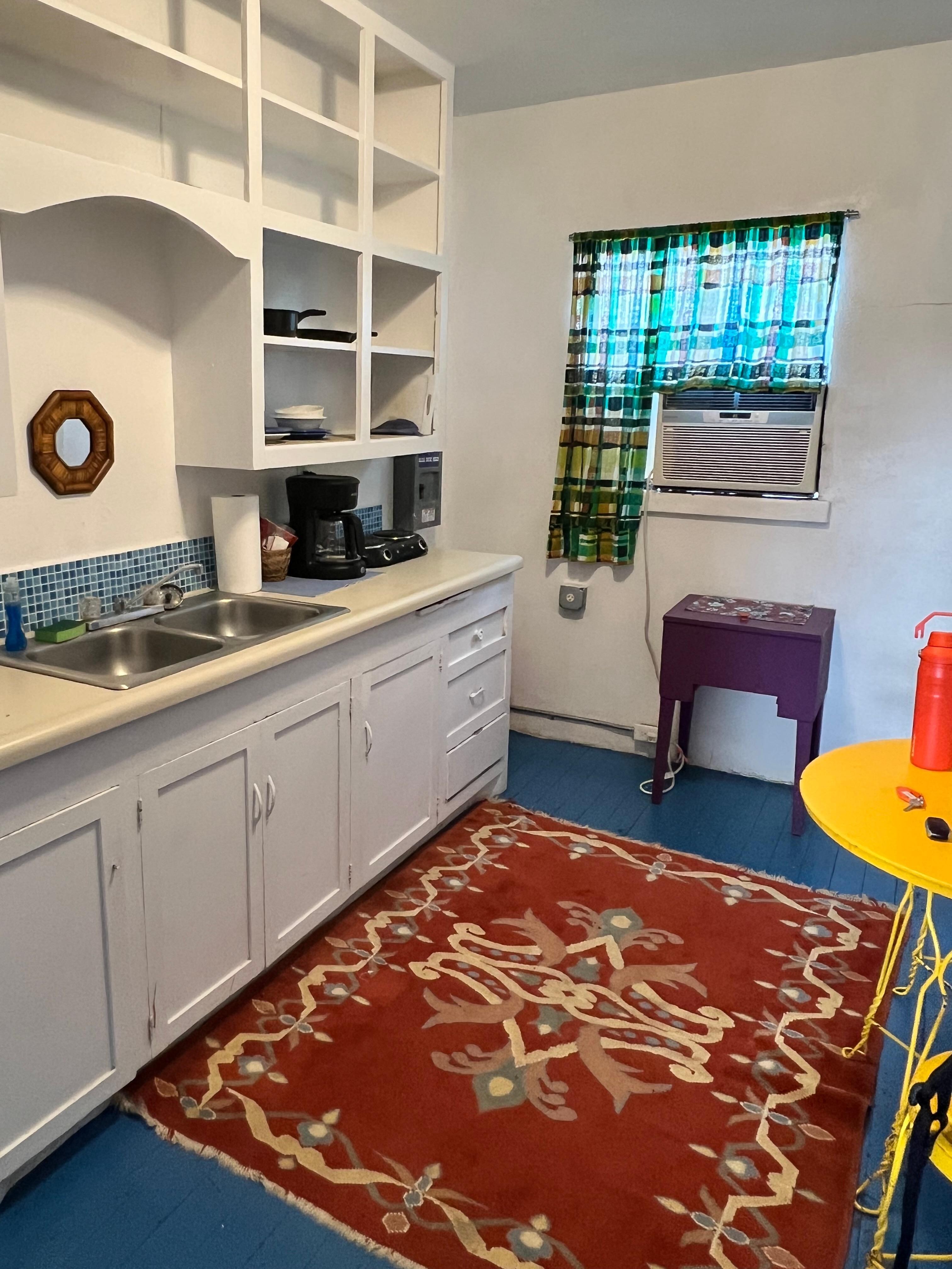 Kitchenette area with window a/c