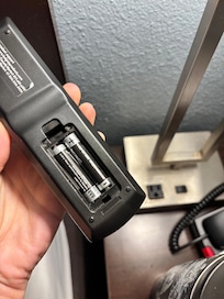 Remote to room TV missing back, buttons sticky