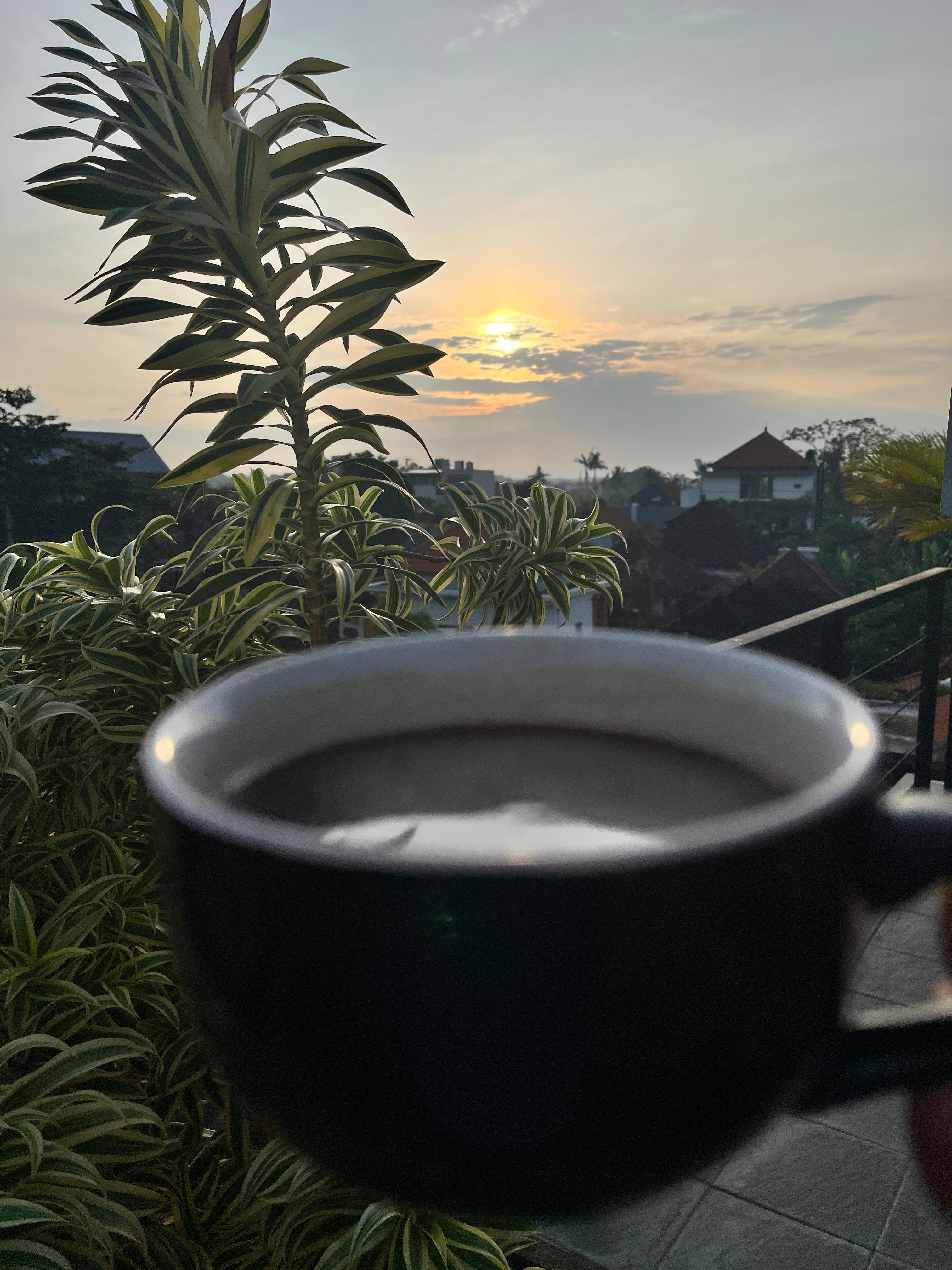 Sunrise and coffee on the rooftop