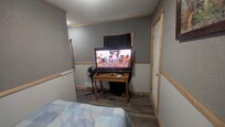 large tv blocking the only window which faced the owners' home and where you check in