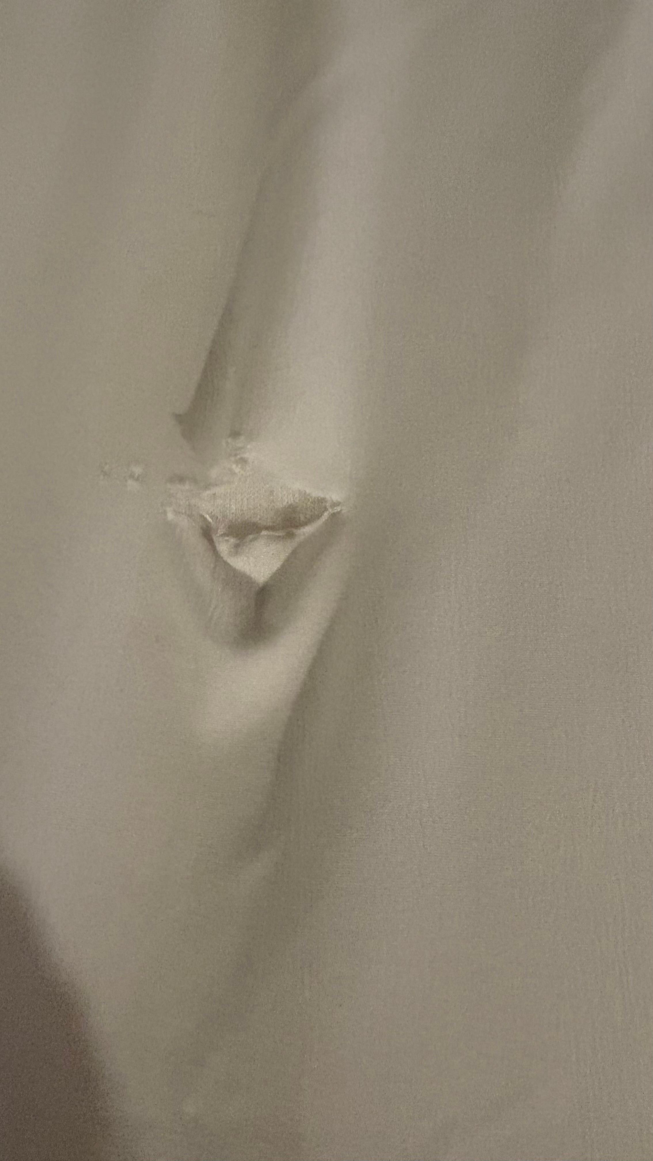 Hole in fitted sheet 