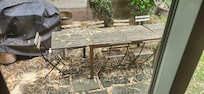 Broken grill and unclean patio