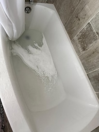 This is the clogged tub. This should be been noticed when they cleaned the tub because it had to be clogged then which was less than 24 hours later.