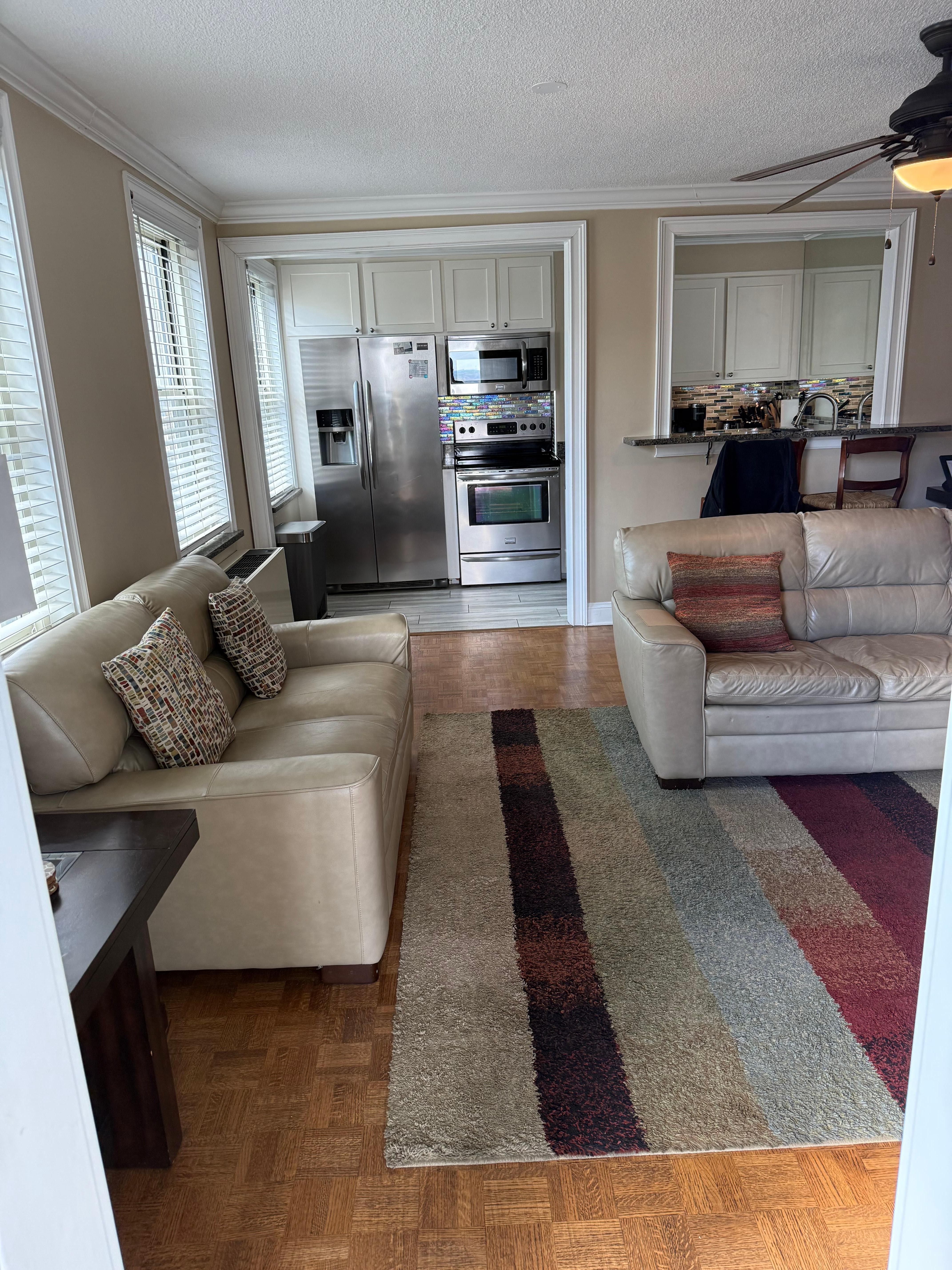 Looking into the living room toward kitchen from the deck