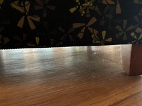 Dust and cobwebs under a chair