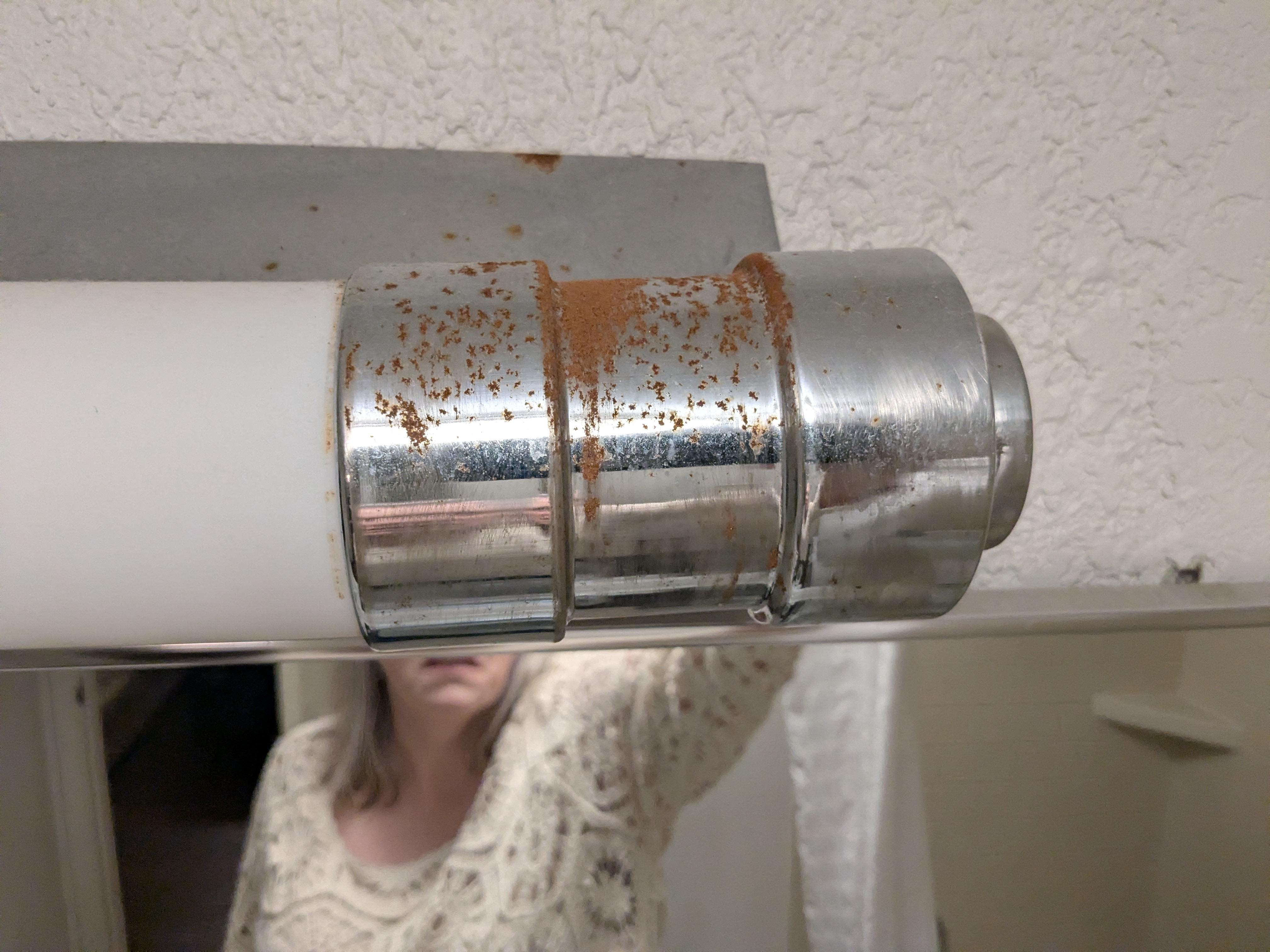 Bathroom over sink light fixture end