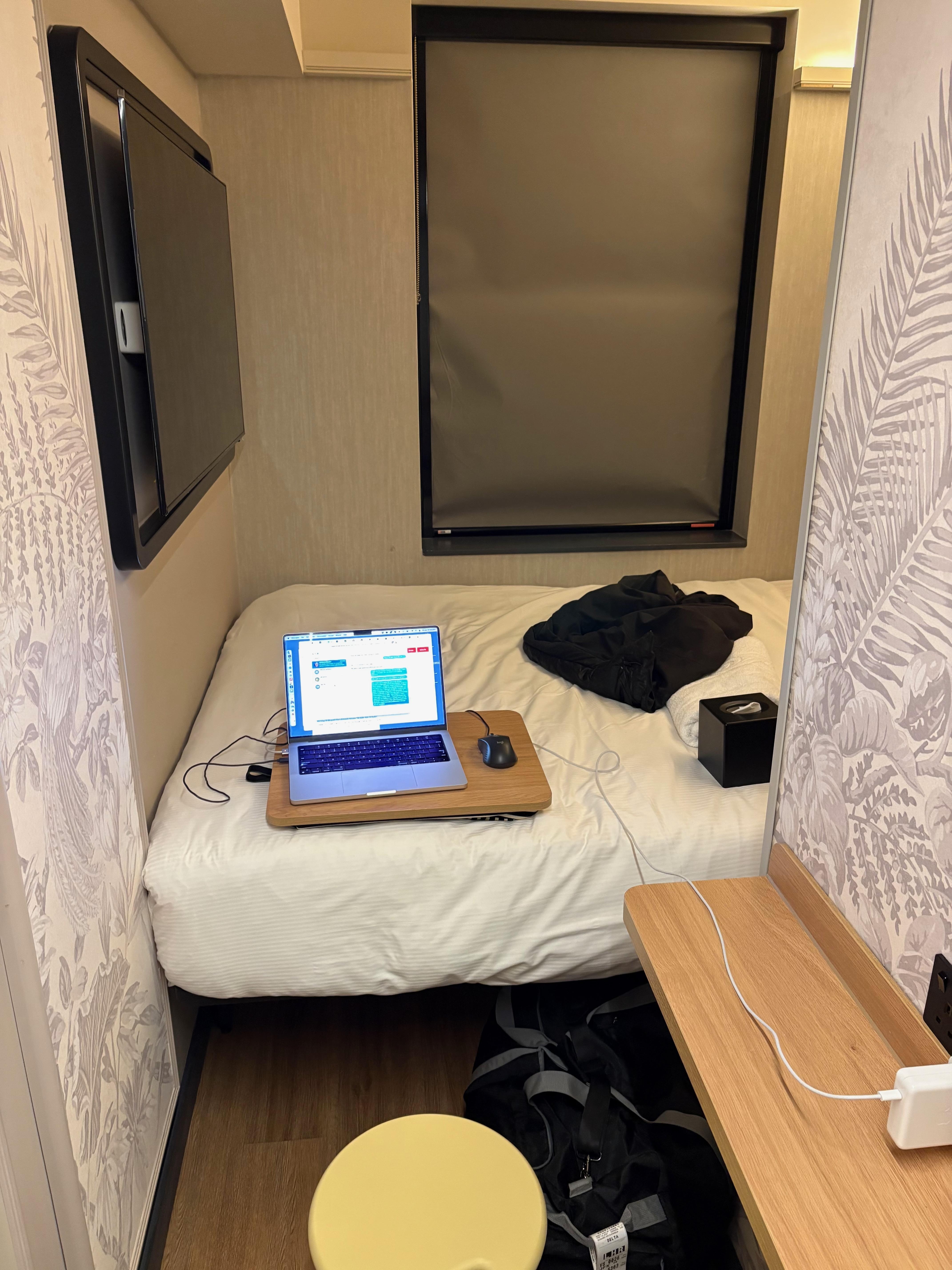 A breakfast tray turns out to also work well as a desktop for a laptop computer.