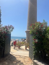 The beach seen from the garden of the hotel