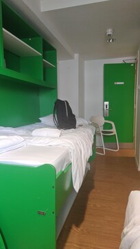 Desk turns into a bed, had to have the door open in the morning to let in some cool air!