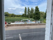 View of river from window. Higher than street level so no passers by looking in.