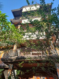 Rooms with. Alcony overlooking garden and family temple in the middle