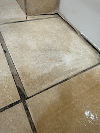 Broken tile in bathroom.