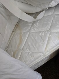 Stained mattress.