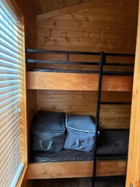 Bunk beds (single each) with a pocket door