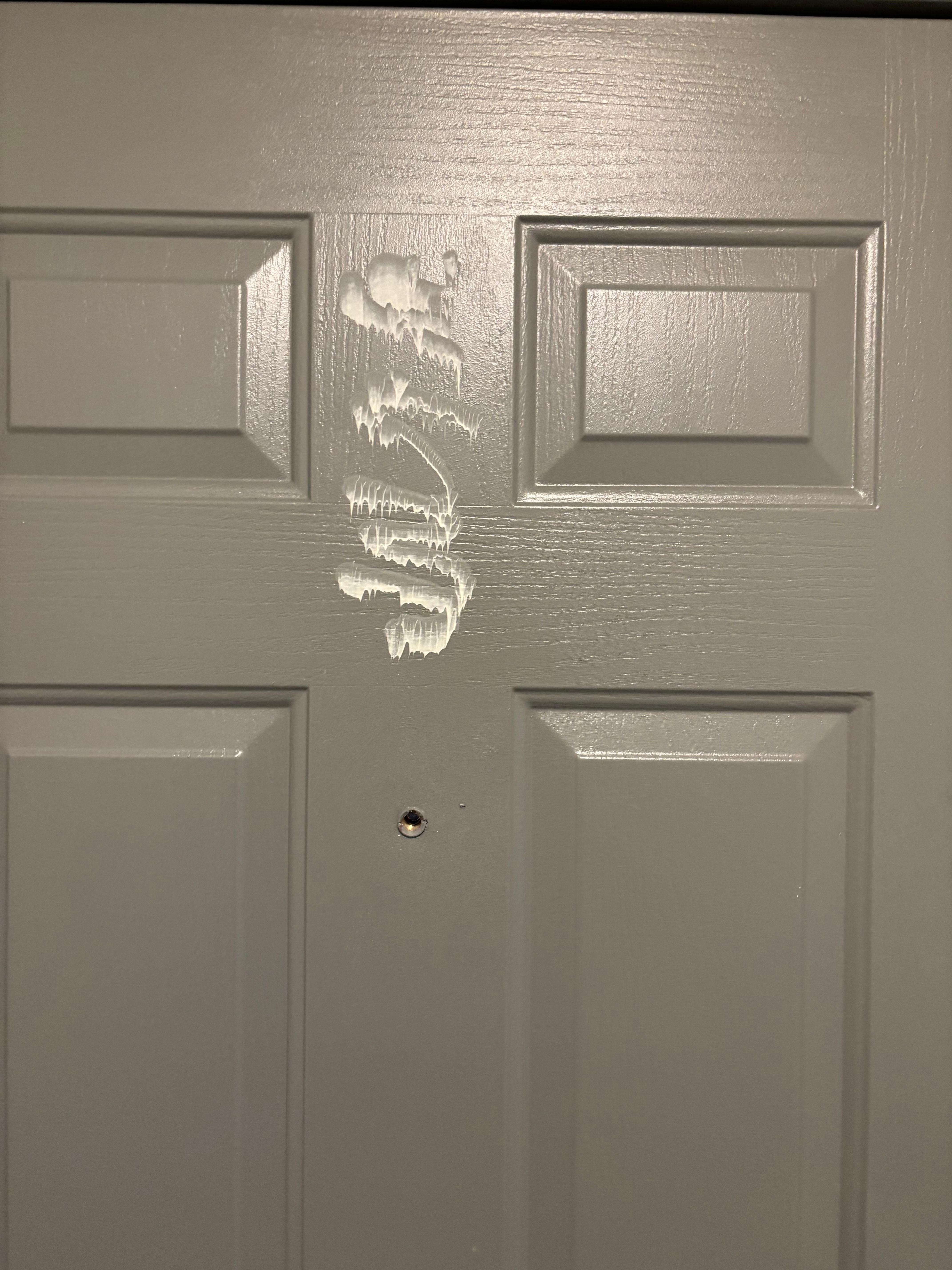 Blocked peephole & mystery door stain