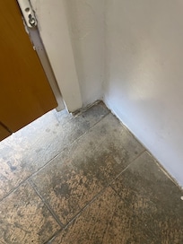 Bathroom floor in the pool area.
