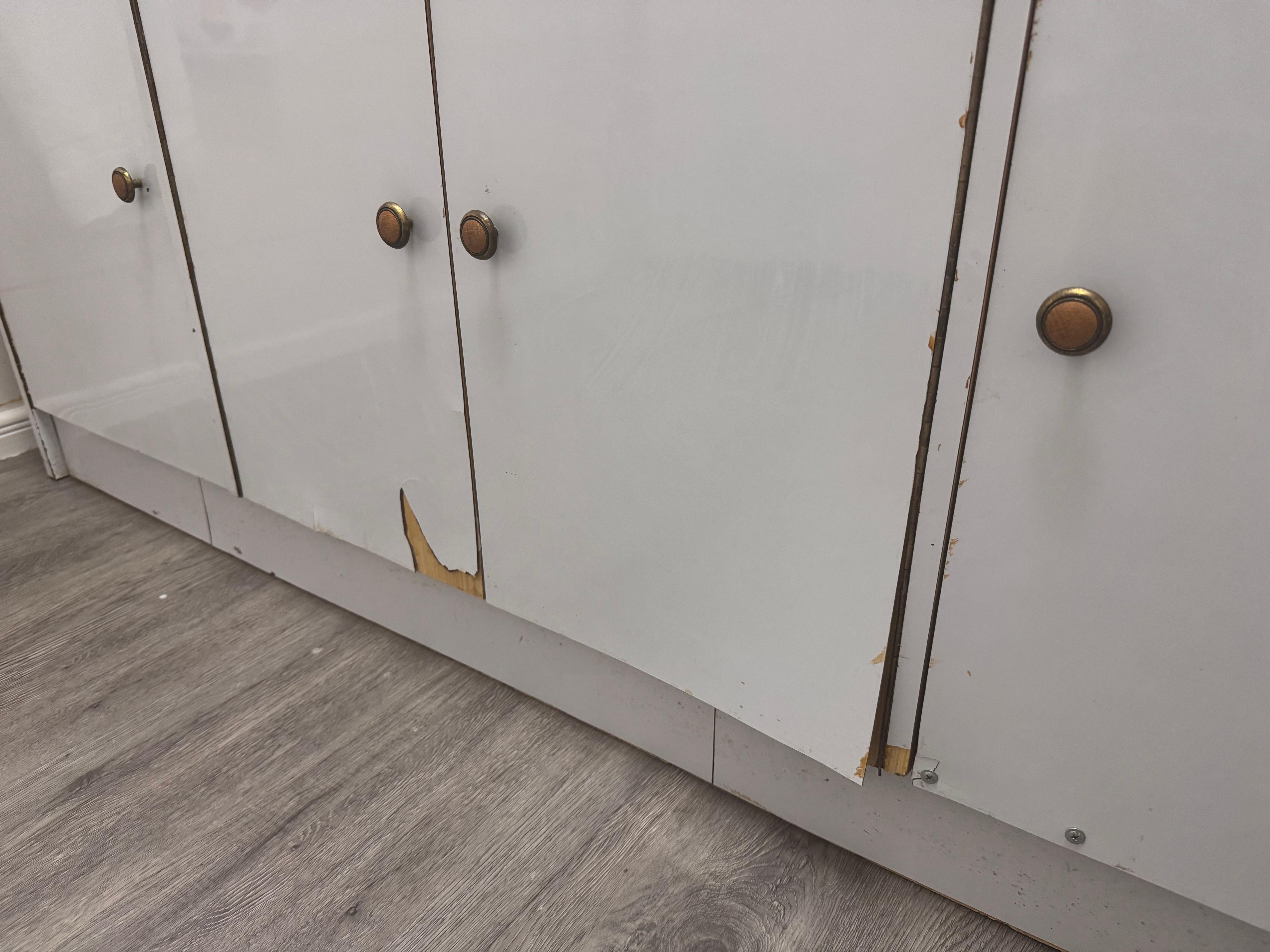 Kitchen cupboard doors with peeling surface