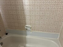 Coreplast plastic sheet around bathtub.