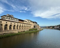 View of the Arno River from the Ponte Vecchio Bridge