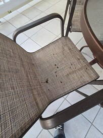 Outdoor patio furniture with bird mess and poop