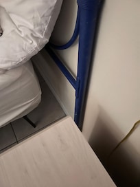 Bed frame not attached to headboard.