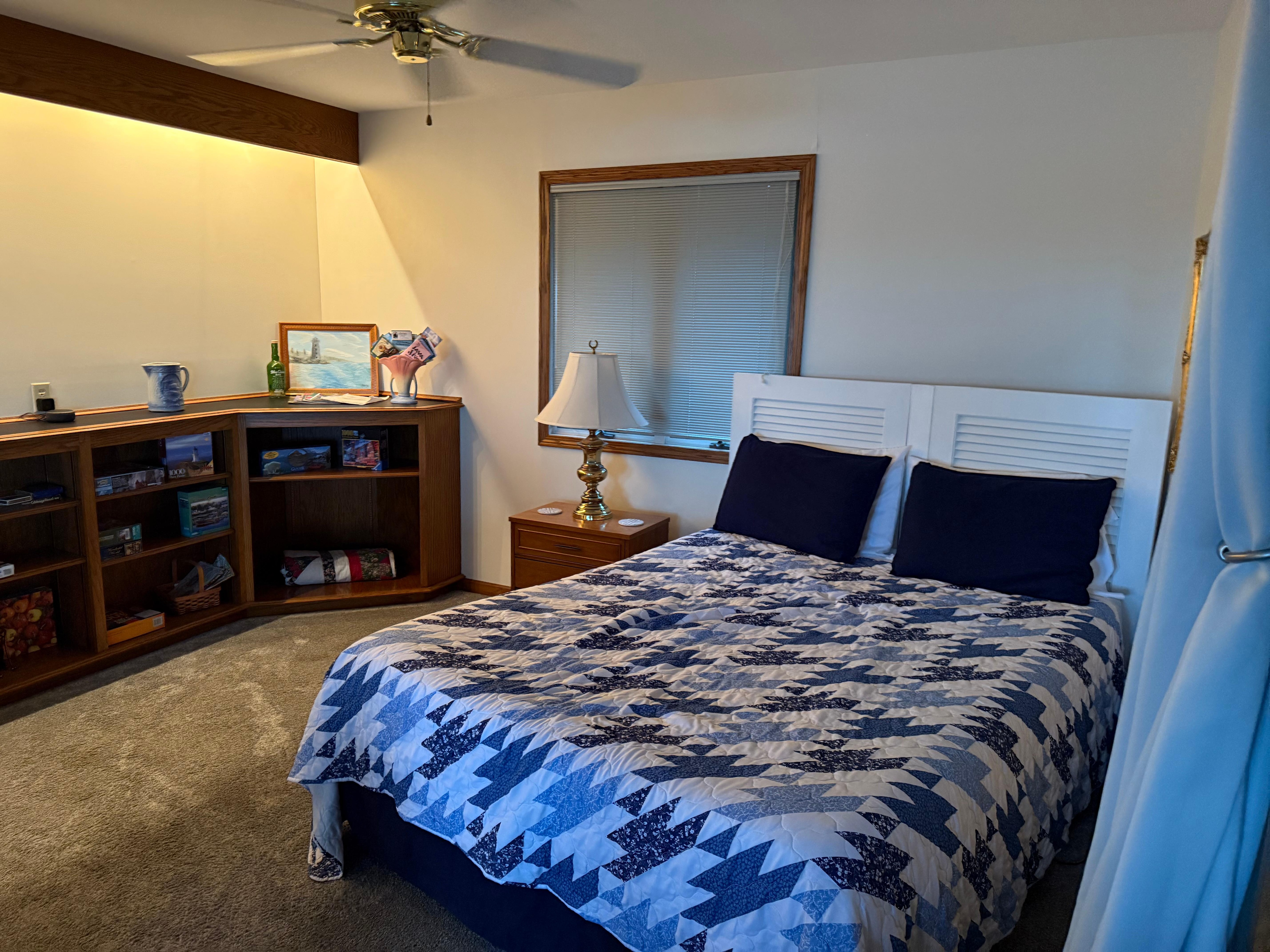 Bed off living room area 