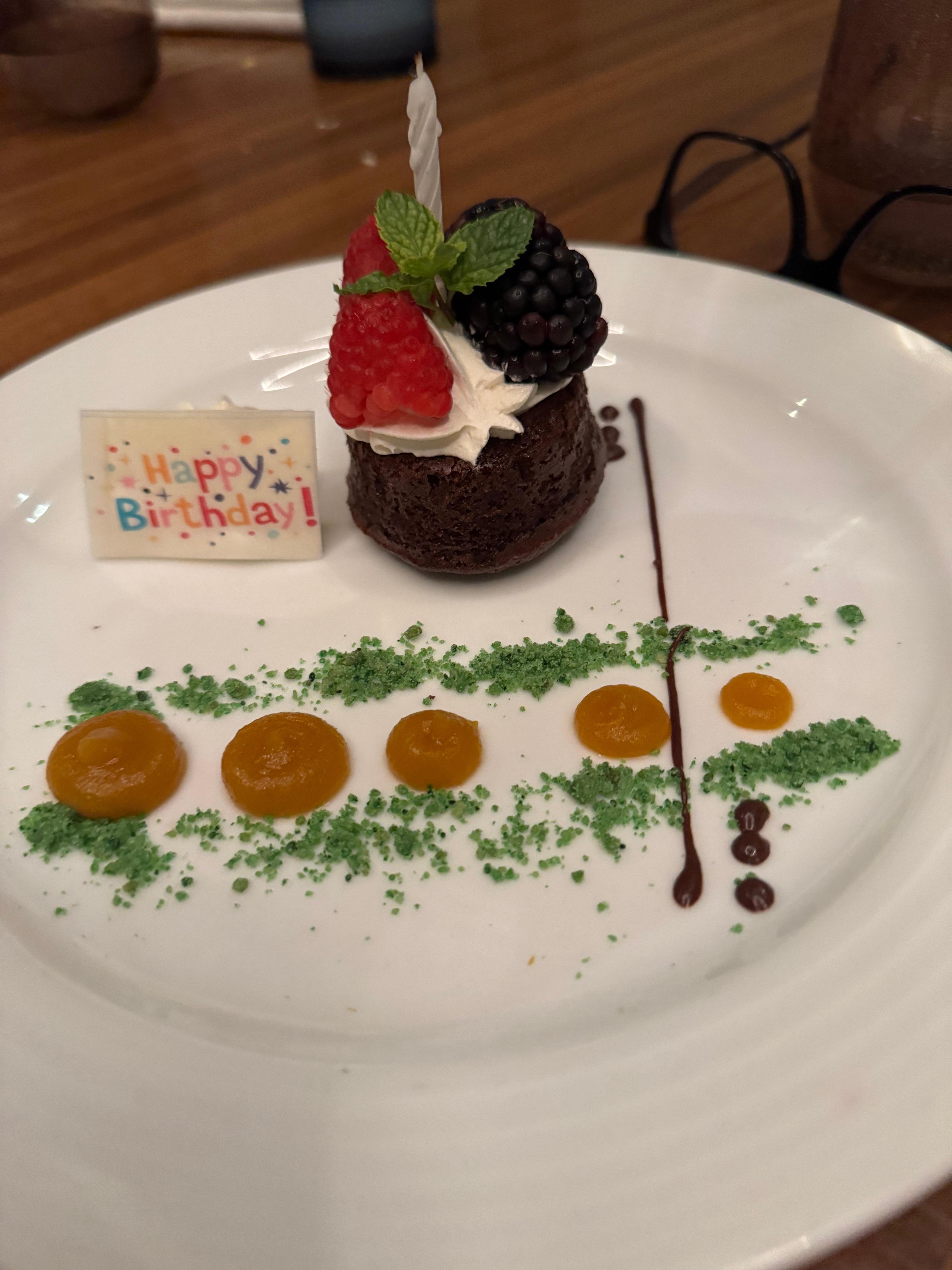 The staff at the restaurant brought out a cake to celebrate my daughter turning 18!