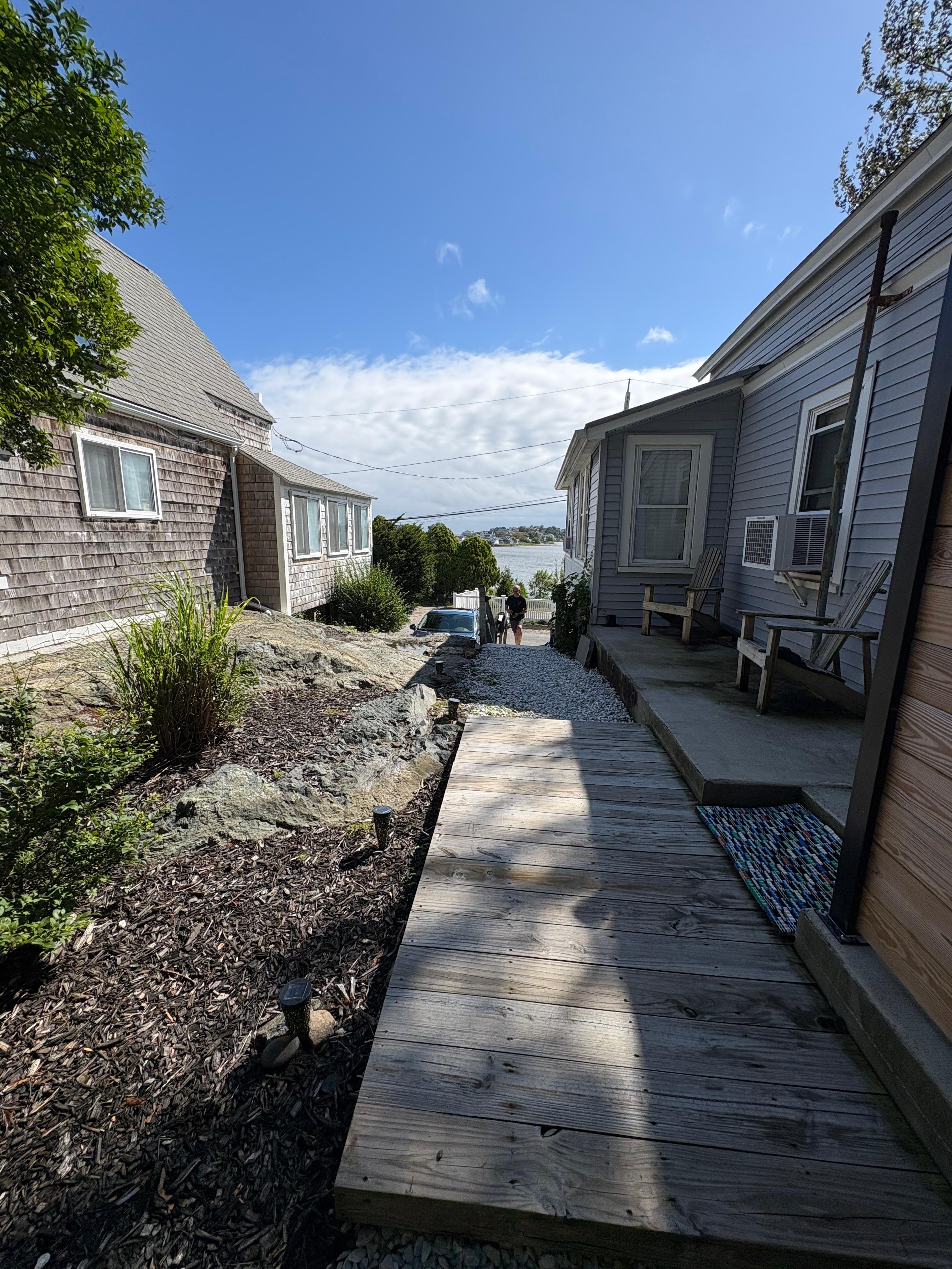 View of Straits Tidal Pond from the patio. We enjoyed the gas fire pit at night! Cozy!