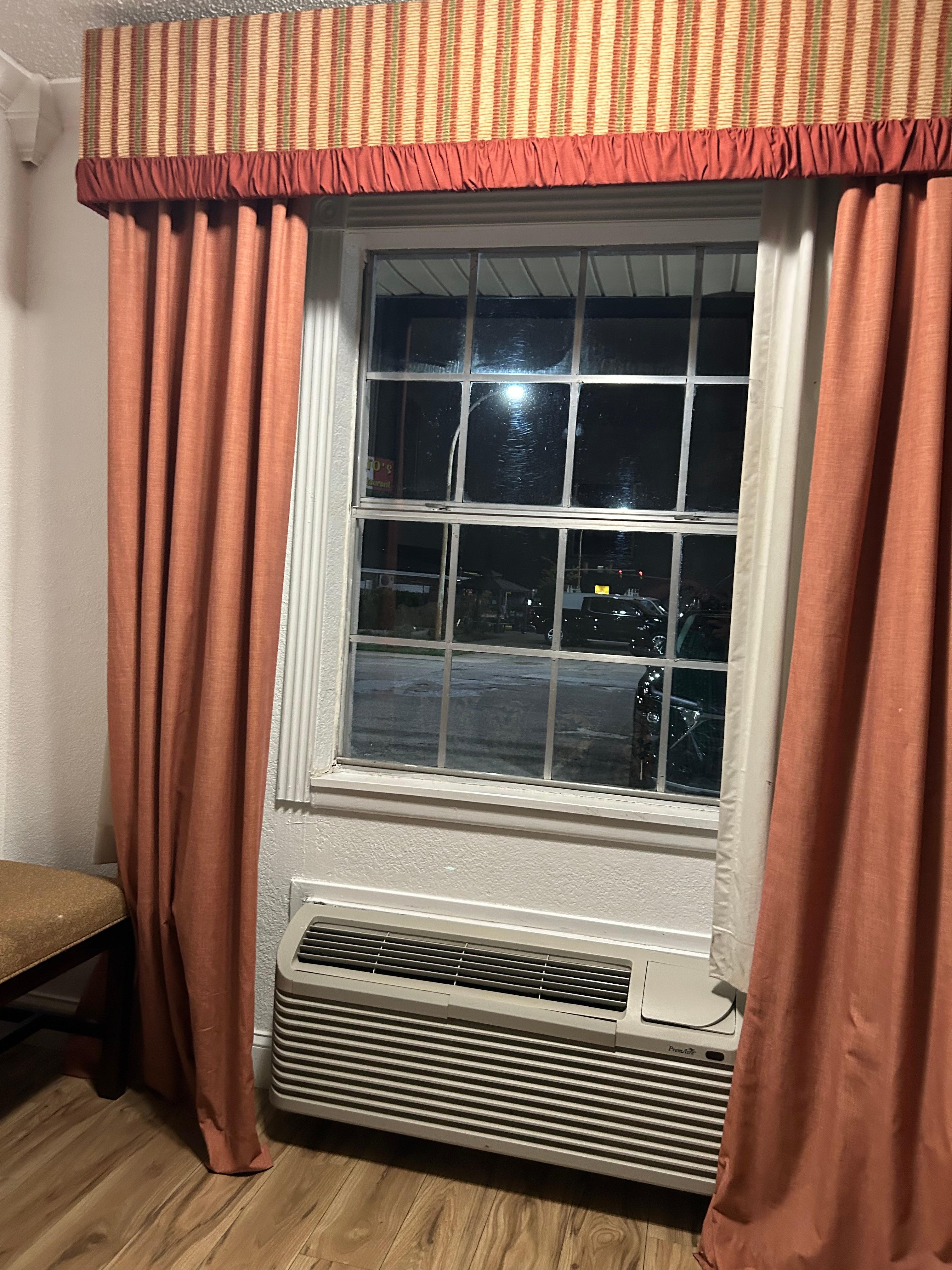 Dirt visible on room darkening white plastic shaded