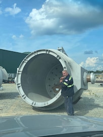 Co worker by a ladle at Nucor Lexington NC