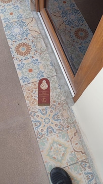 Tag laying of the floor. they just left it on the ground