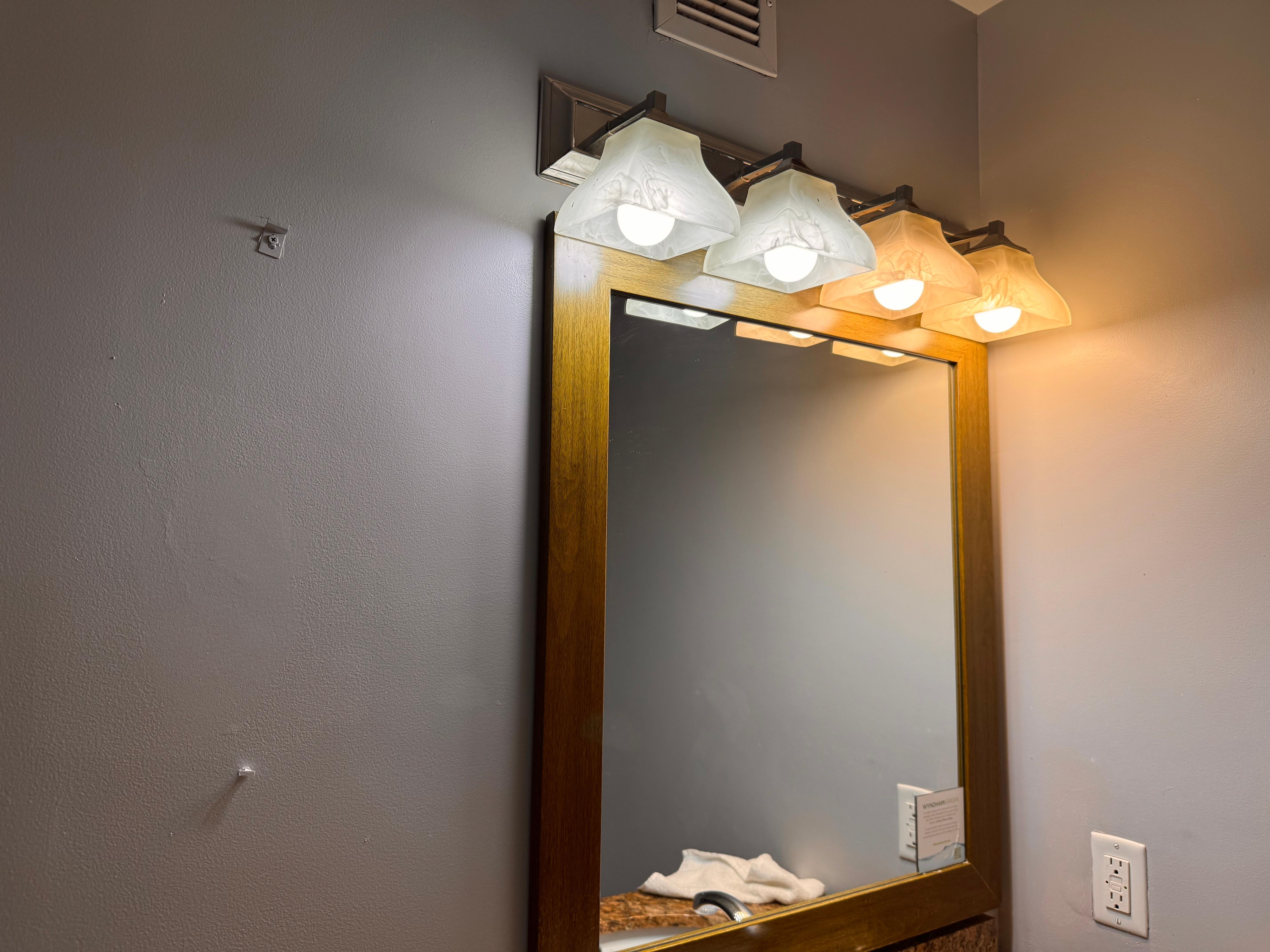 Bathroom lights are not even the same type.