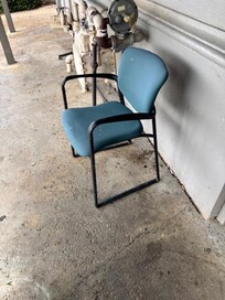 Employee breaks smoking pens at entry doors.