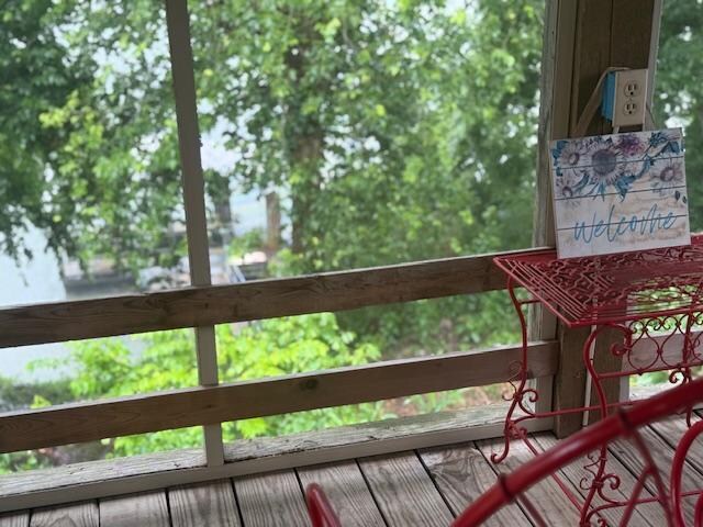 This is in the back patio where you can see the river and your own dock where you can fish! Beautiful scenery!