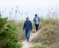 One of my sons and his wife after a stoll on the beach