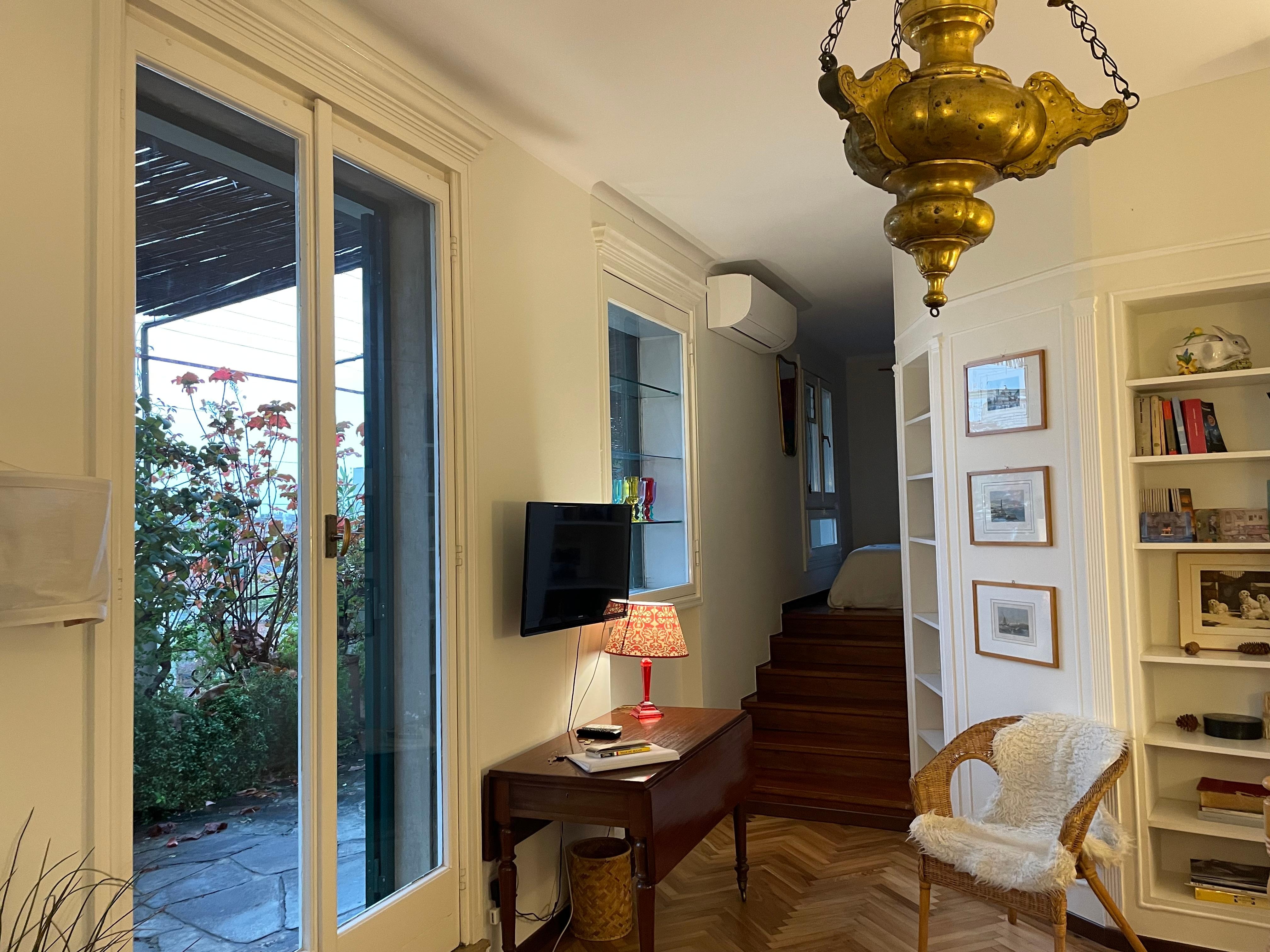 Living room with doors to large terrace