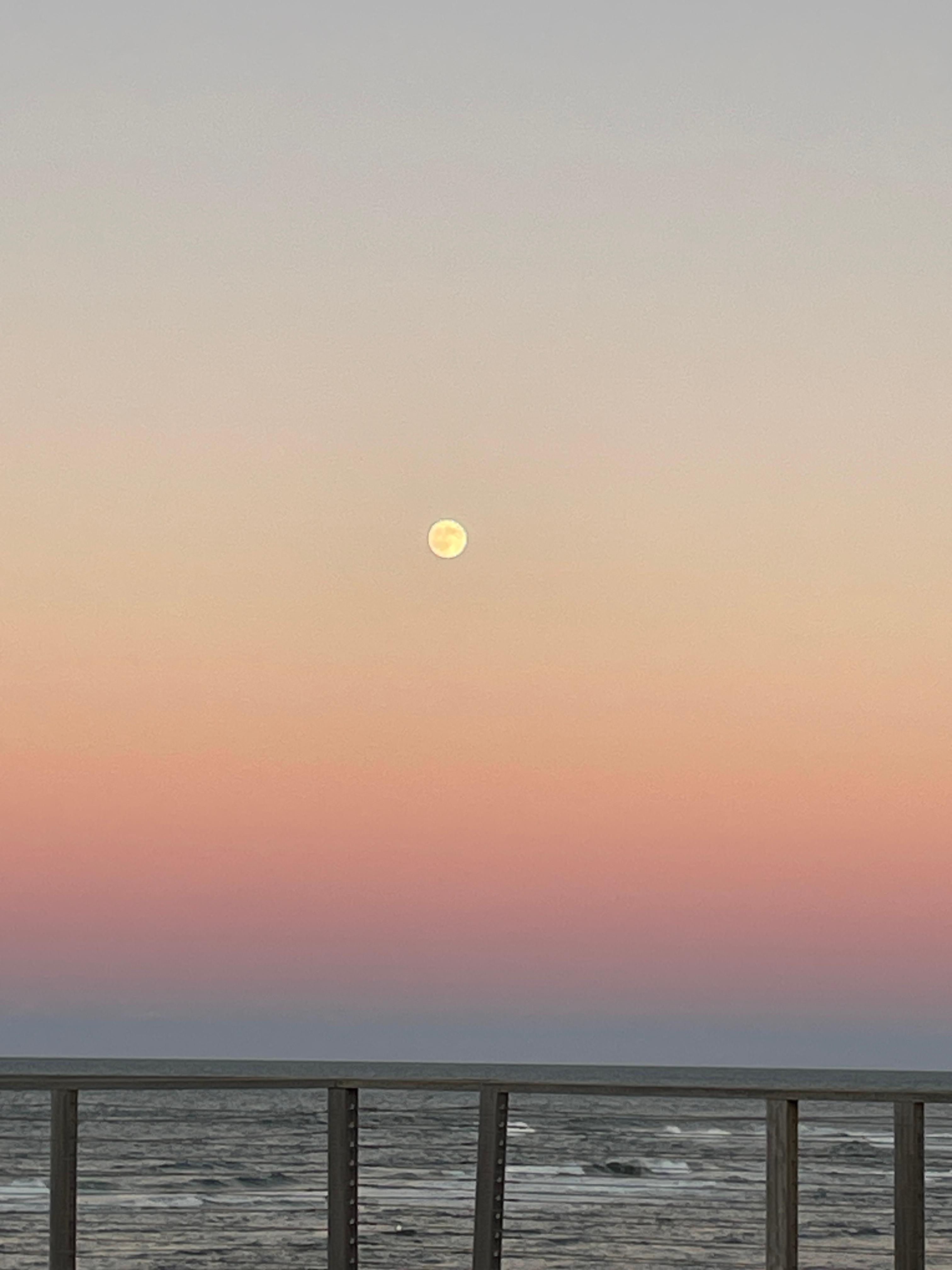 Full moon at dusk.