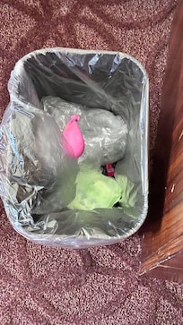Ballon from behind bed; unused sanitary pad found in drawer