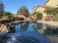 Beautiful view of the pool/back yard from the hot tub