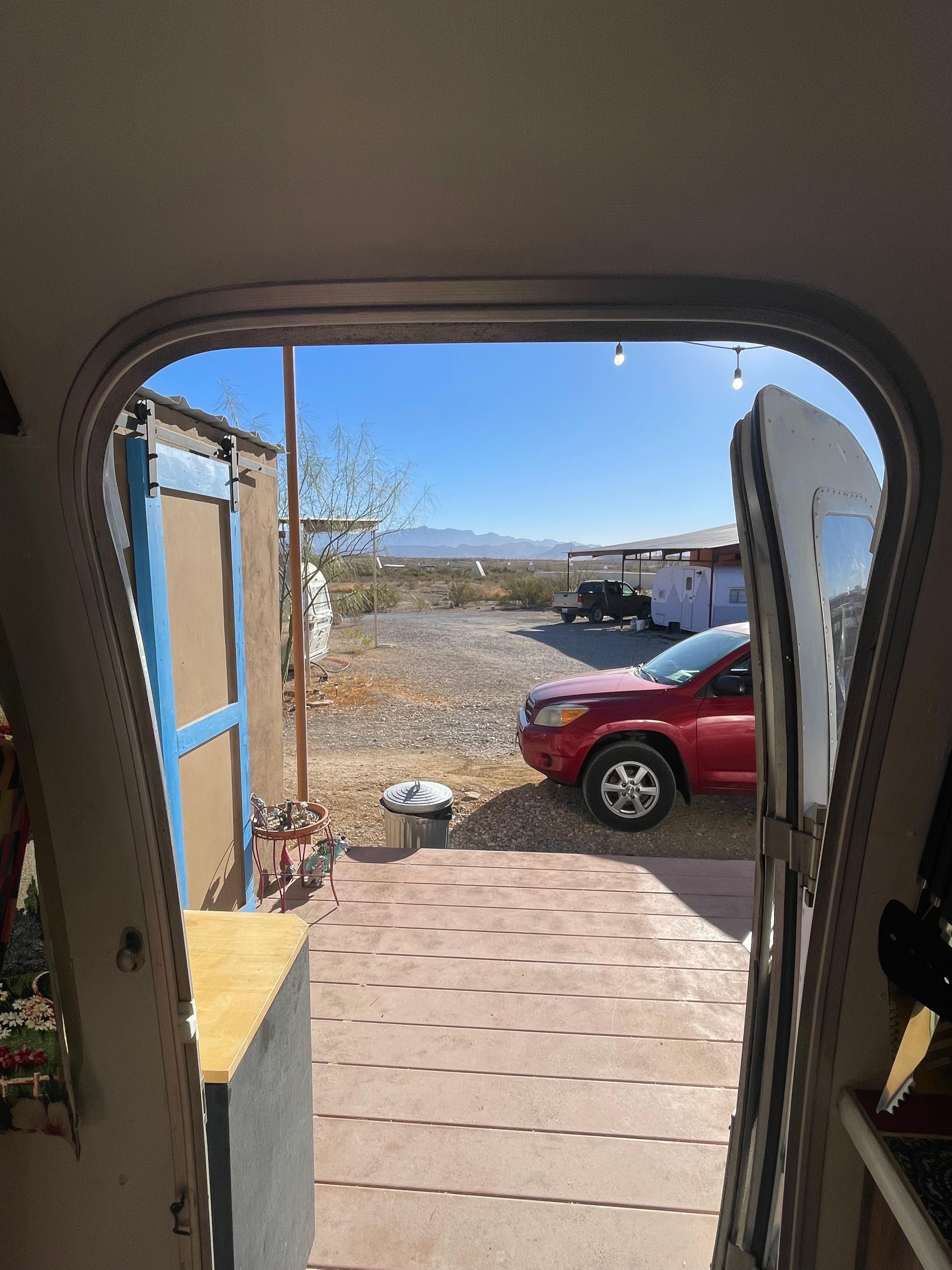 Front door of Pixie. See the house/building right in front of the deck. 